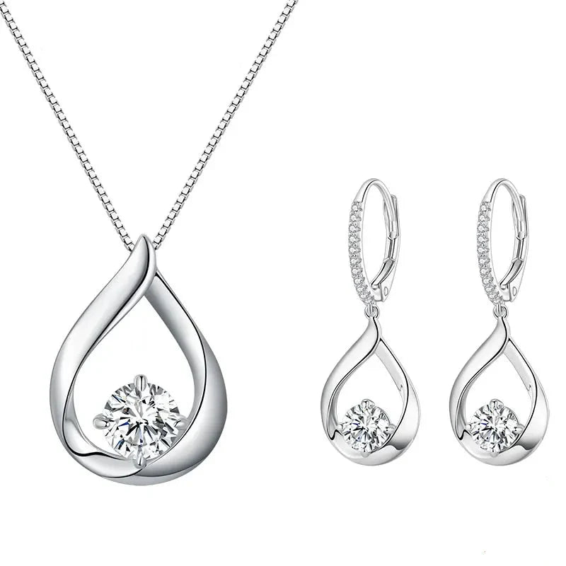 Moissanite Waterdrop Earrings or Necklace in Sterling Silver