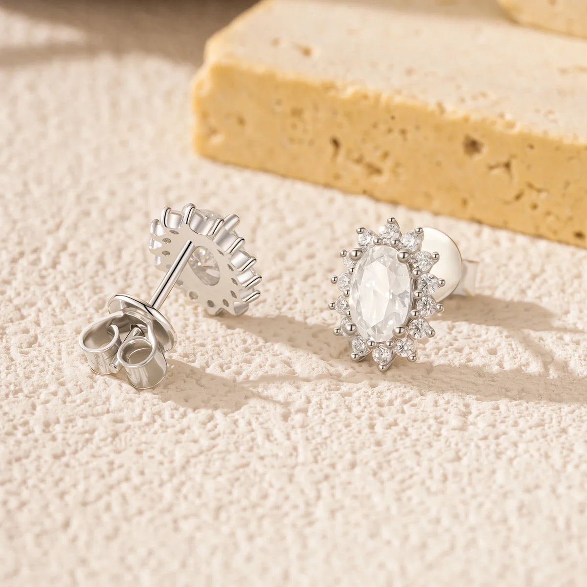 Oval Moissanite Floral Halo Stud Earrings in Sterling Silver
