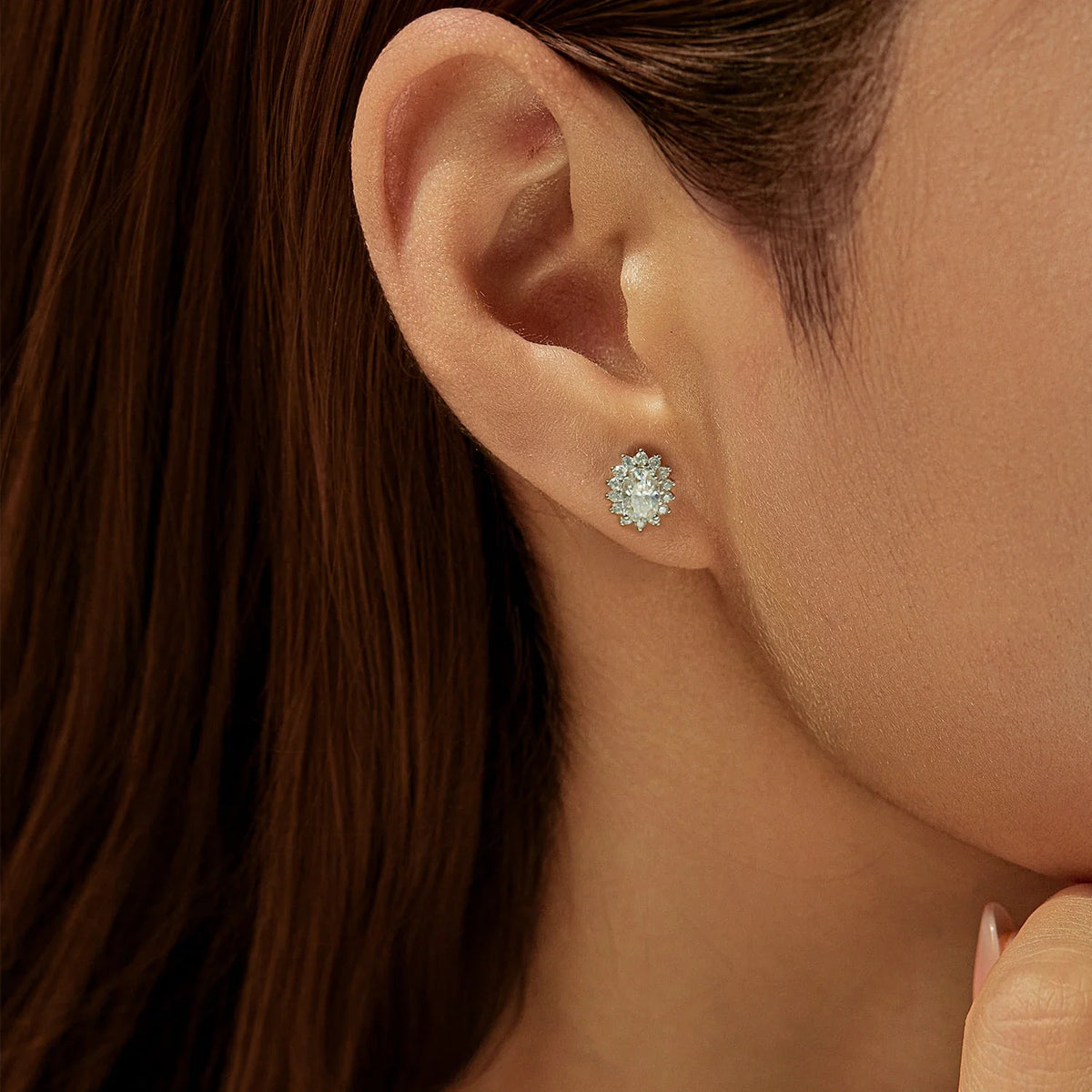 Oval Moissanite Floral Halo Stud Earrings in Sterling Silver