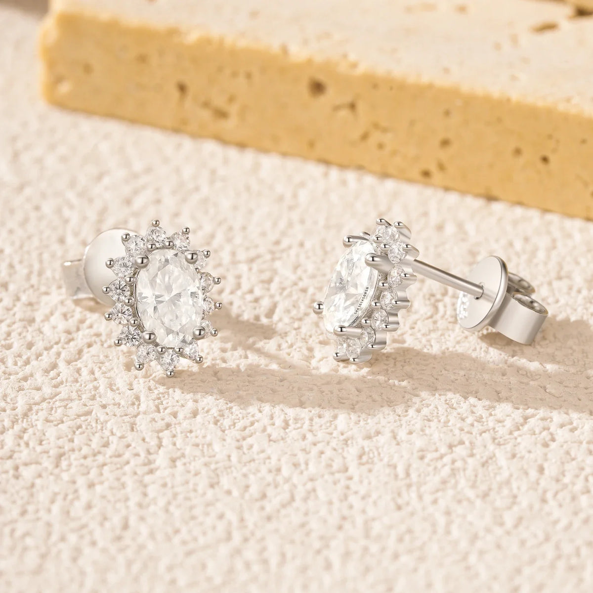 Oval Moissanite Floral Halo Stud Earrings in Sterling Silver