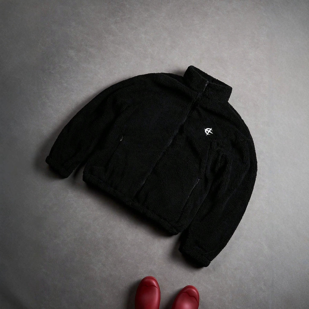 Black Furry Jacket With A Zipper And Embroidery On The Left Chest