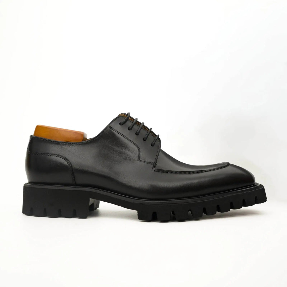 Black Calfskin Apron-Toe Derby Shoes with Lug Sole
