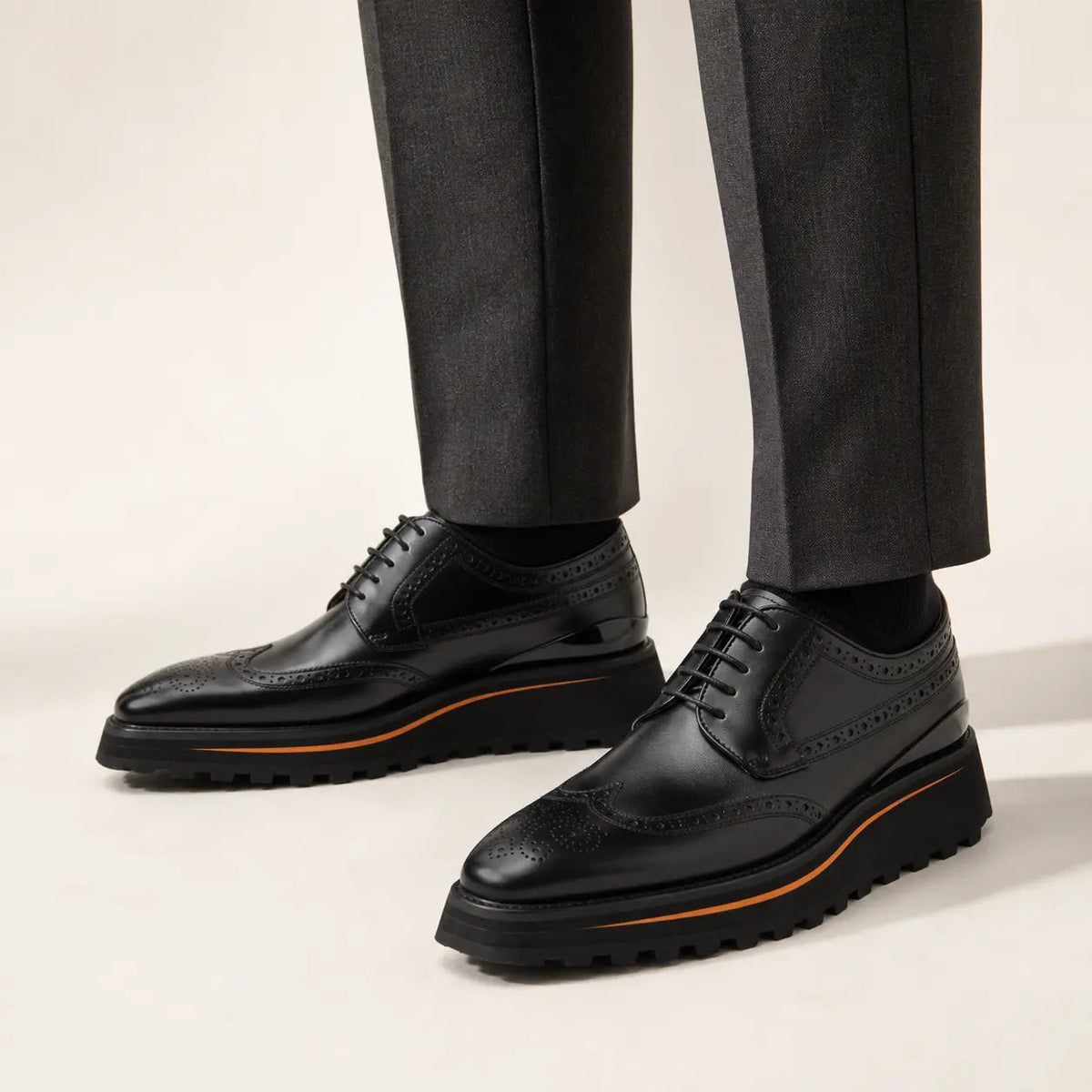 Black Wingtip Derby Shoes with Brown-Edge Lug Sole