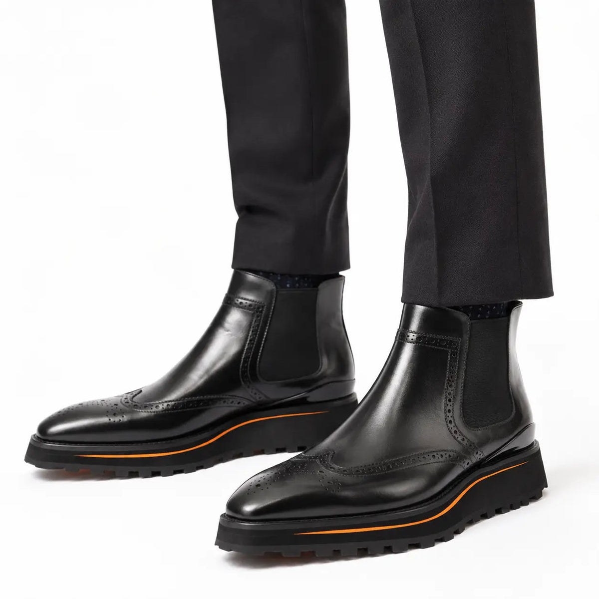 Black Wingtip Chelsea Boots with Brown-Edge Lug Sole