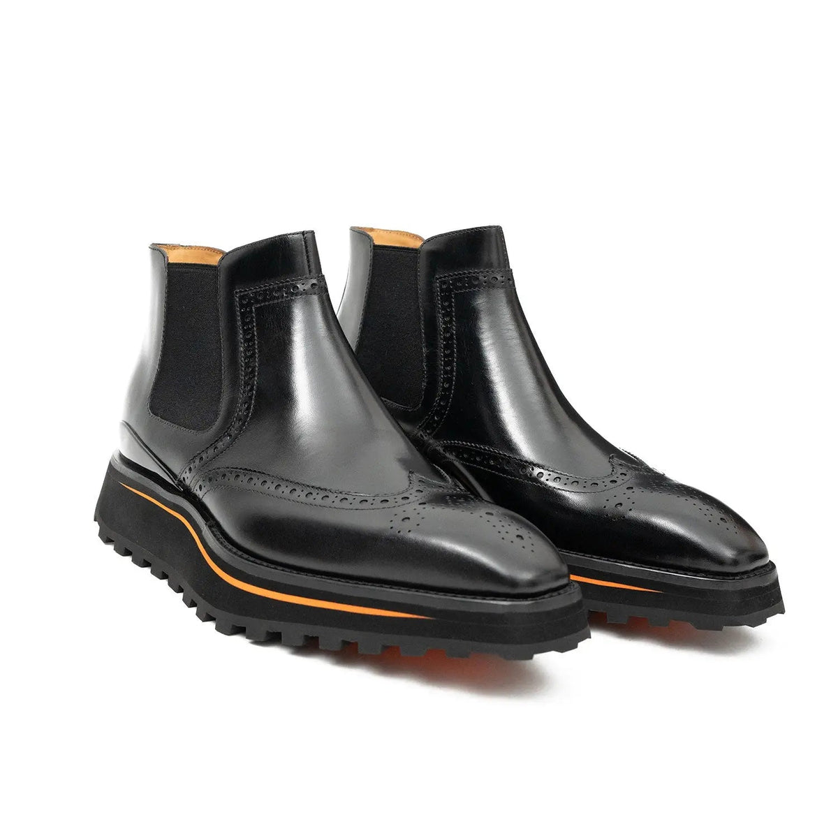 Black Wingtip Chelsea Boots with Brown-Edge Lug Sole