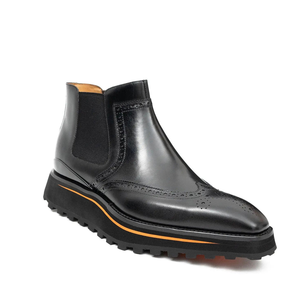 Black Wingtip Chelsea Boots with Brown-Edge Lug Sole