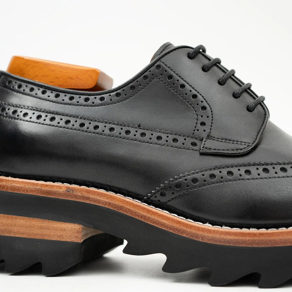 Black Wingtip Derby Shoes with Brown-Band Lug Sole
