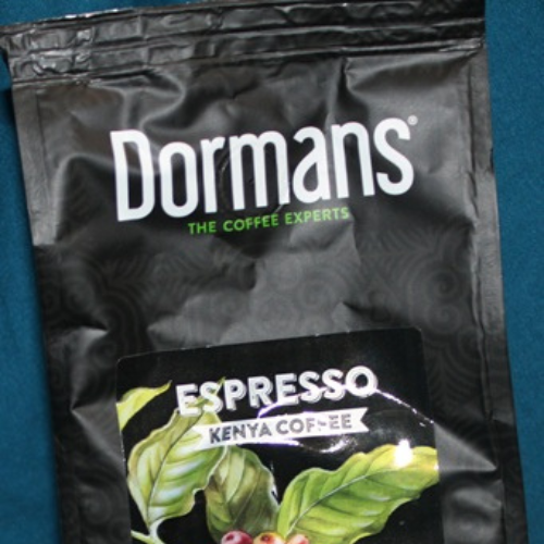 Dormans Coffee Experts espresso coffee package close-up showing premium Kenyan coffee branding
