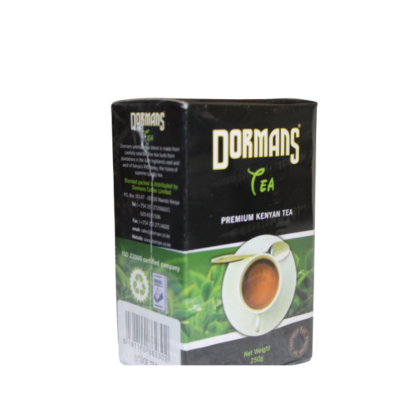 Dormans Premium Kenyan Tea 500g box right-side spine with brand name and green leaf detail