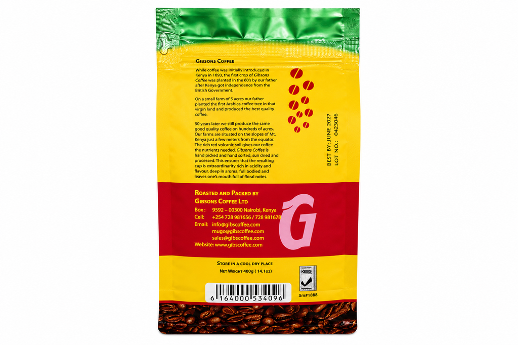 Back view of a roasted coffee bag from Genesis Coffee Co., featuring a yellow and red label with product details, a barcode, and visible coffee beans at the bottom.