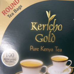 Kericho Gold Kenyan black tea bags close-up with tea cup image
