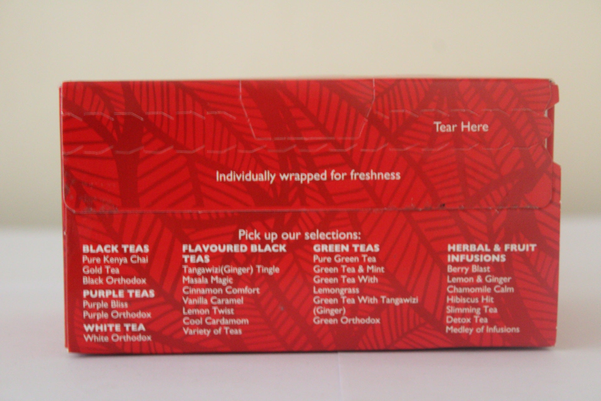 Melvins Hibiscus Hit 25 tea bags box back panel showing individually wrapped bags and tea flavor variety guide
