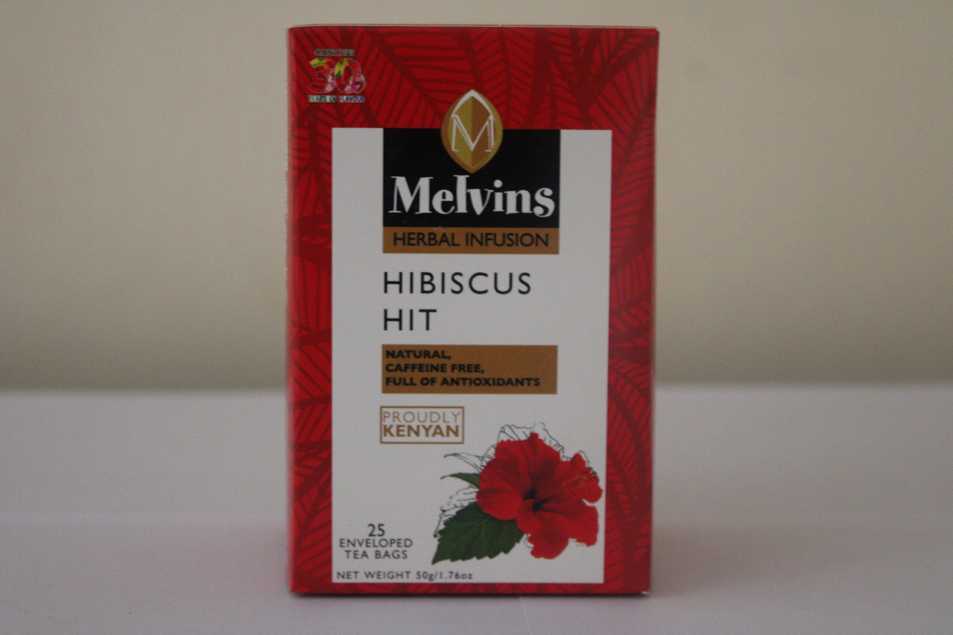 Melvins Hibiscus Hit herbal infusion box front label 25 tea bags caffeine free full of antioxidants proudly Kenyan