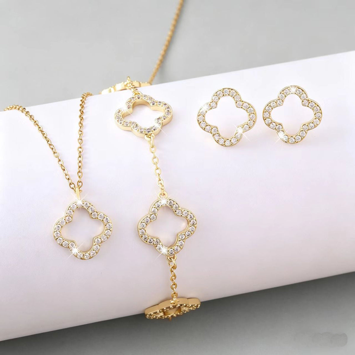 Inlaid Zircon Hollow Four-leaf Flower Three-piece Jewelry Set