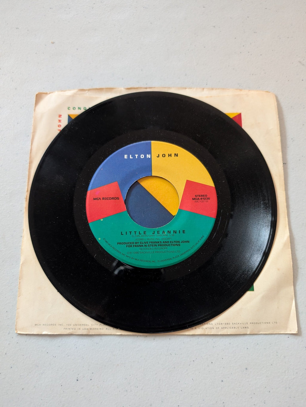 Elton John - Little Jeannie - Conquer The Sun MCA Records MCA-41236 1980 (7 in, 45 RPM, Single, Vinyl Record Album)