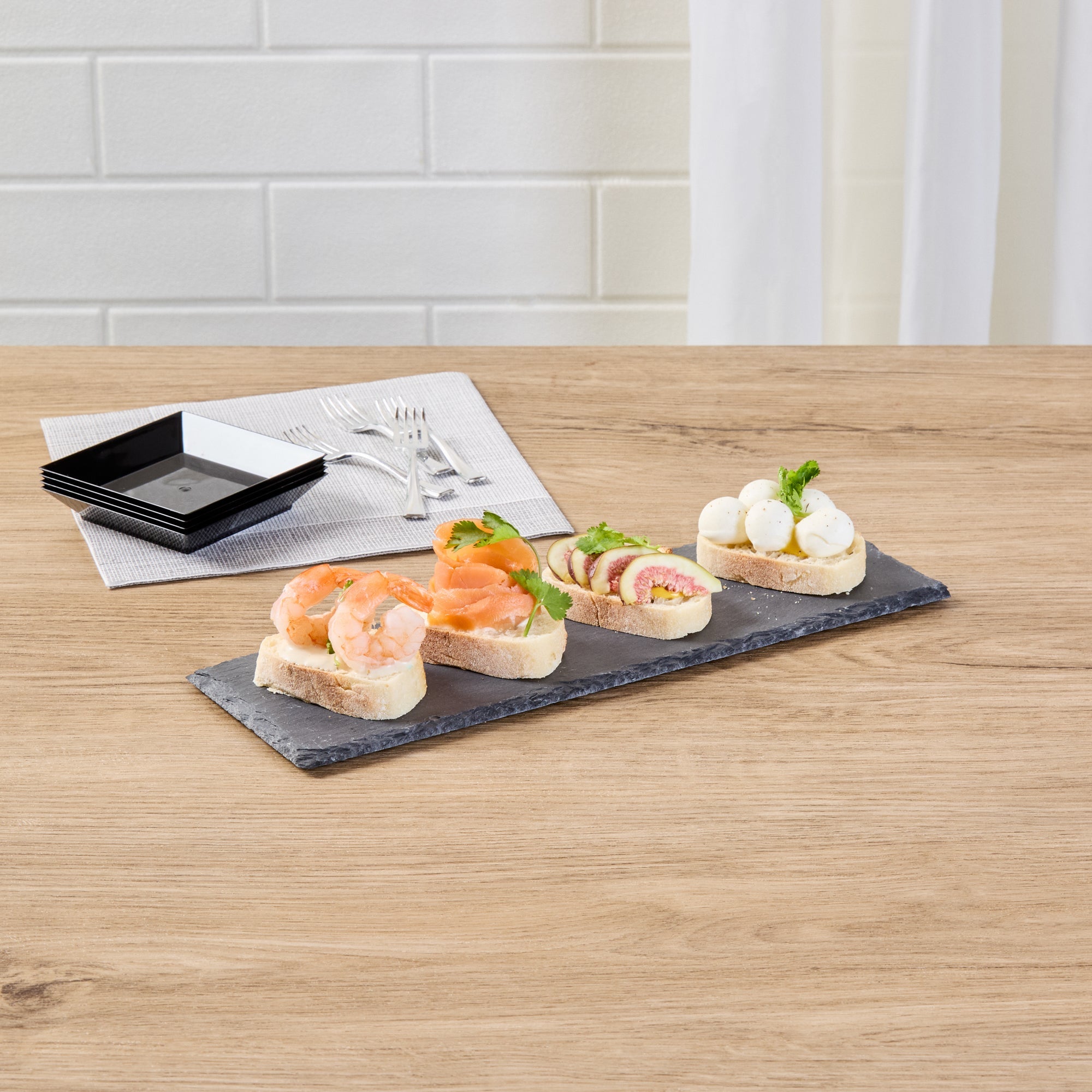 Stone Tek Rectangle Black Slate Serving Tray - 11 3/4" x 4" - 4 count box
