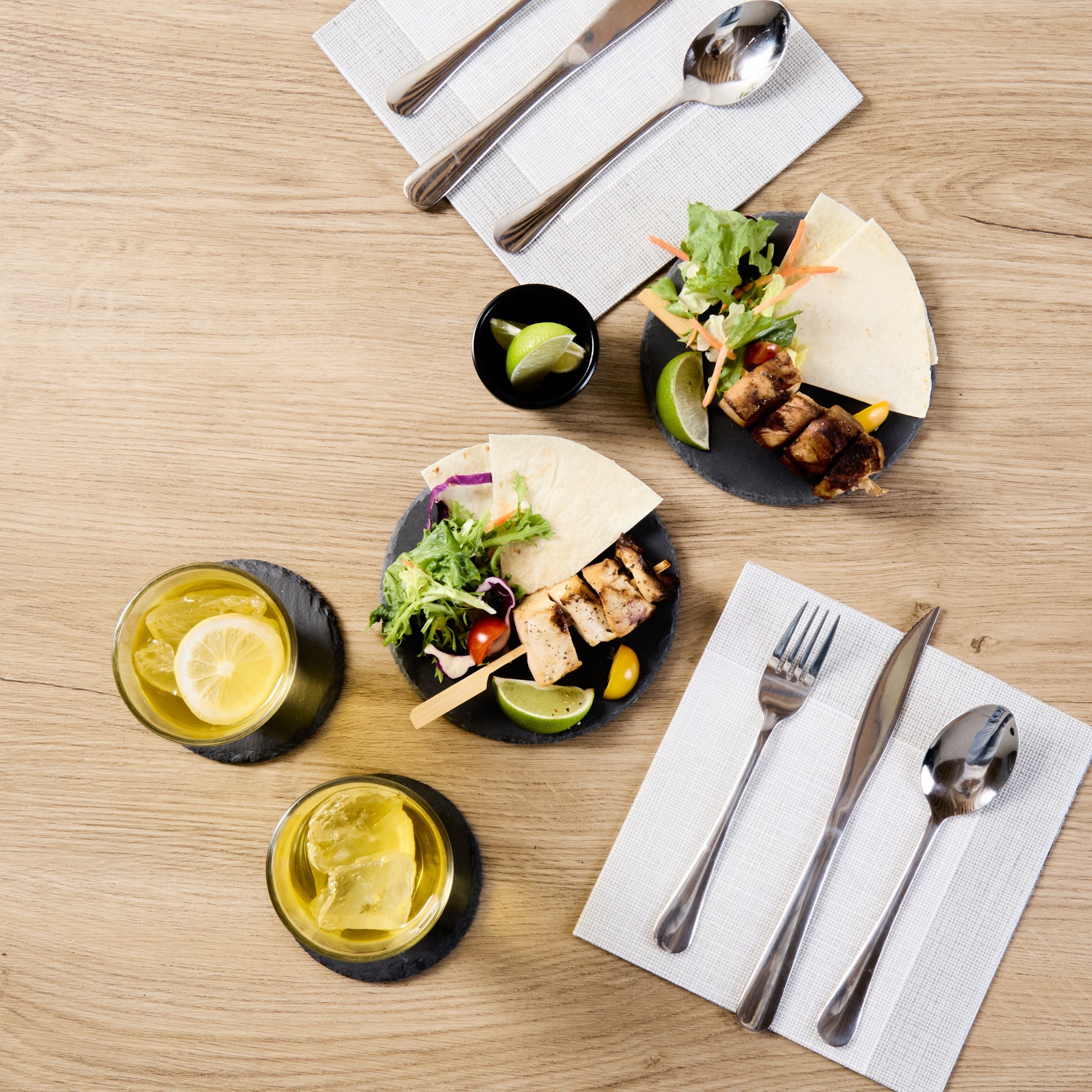 Stone Tek Round Black Slate Serving Plate - 6" x 6" - 10 count box