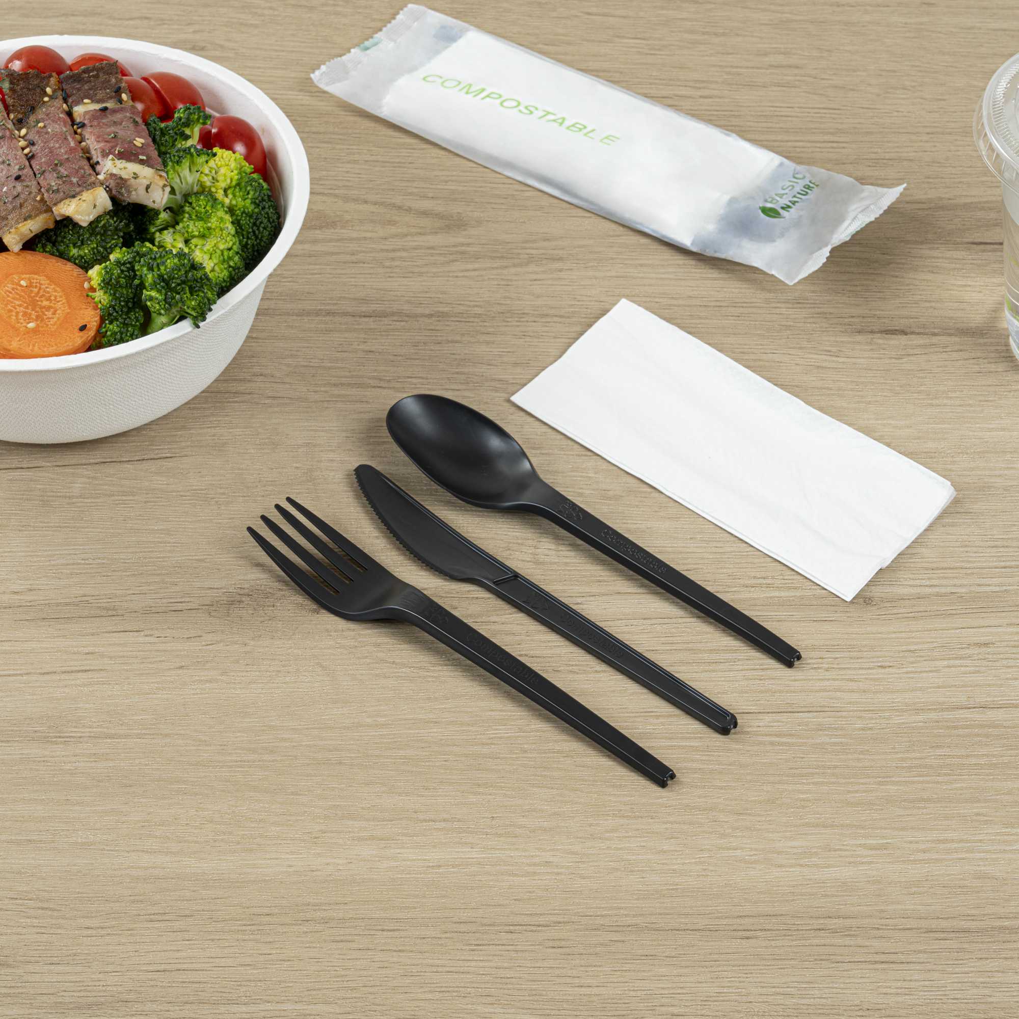 Basic Nature Black CPLA Plastic Cutlery Set - Compostable Wrapper, White Napkin, Heat-Resistant - 6 1/2" - 100 count box