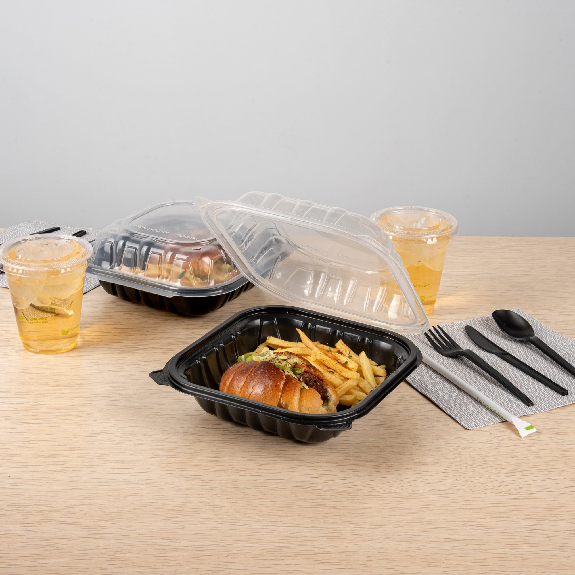Thermo Tek 34 oz Black Plastic Clamshell Container - Microwavable - 8" x 8" x 3" - 100 count box