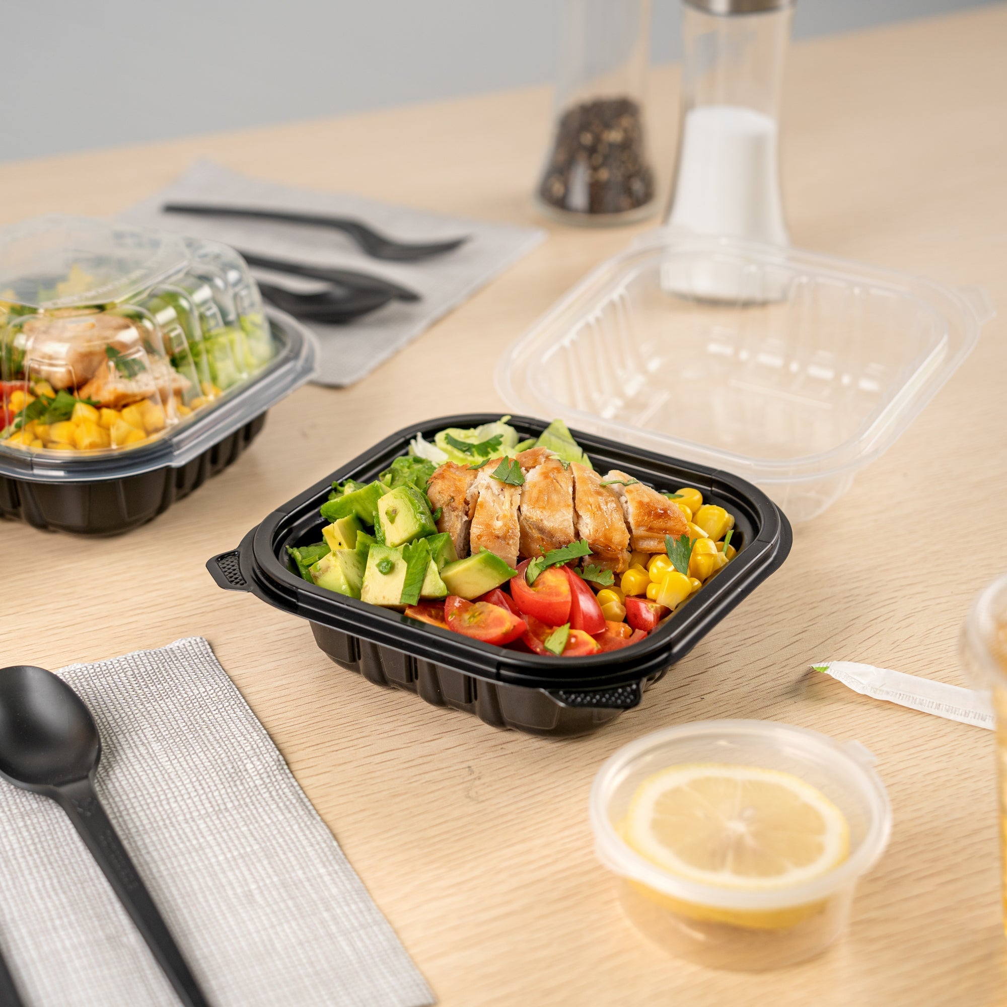 Thermo Tek 16 oz Black Plastic Clamshell Container - Microwavable - 6" x 6" x 3" - 100 count box