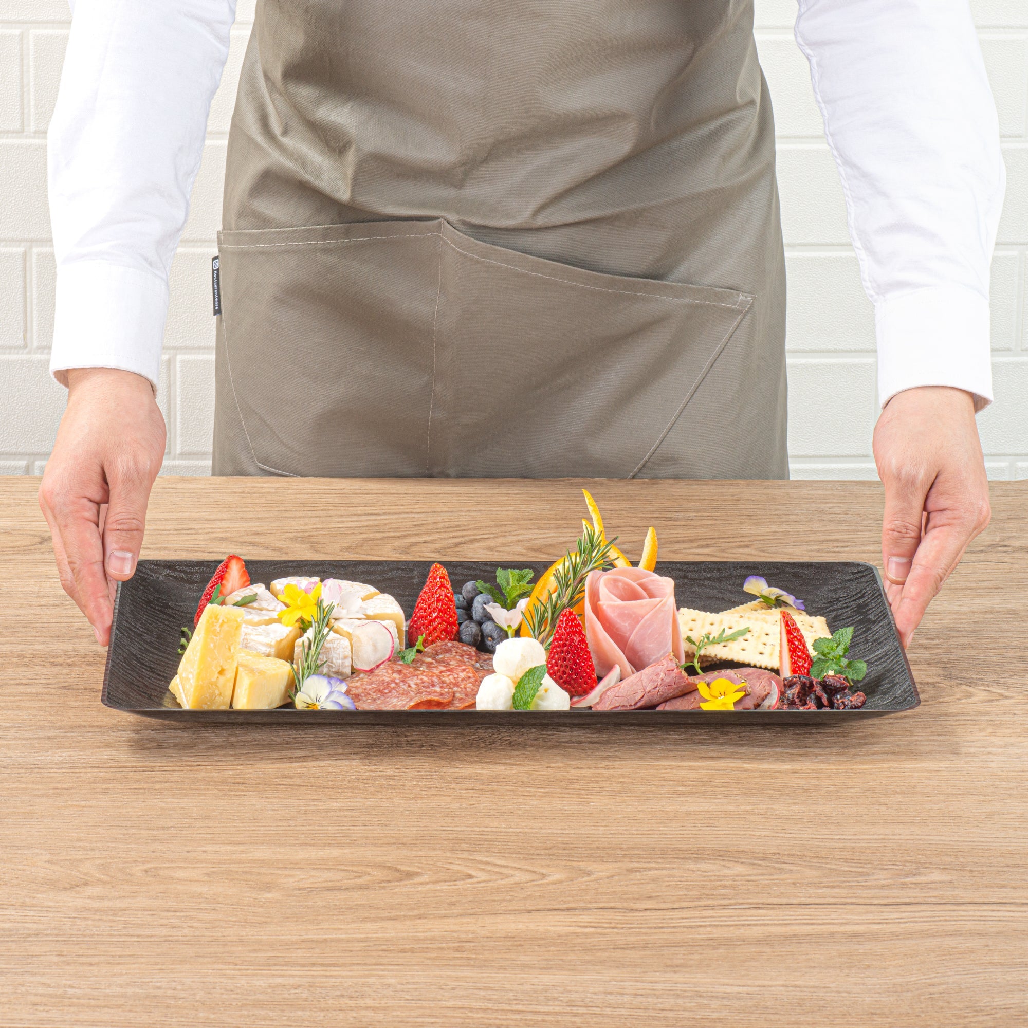 Maxi Serve Rectangle Matte Black Plastic Plate - 17" x 9" - 100 count box