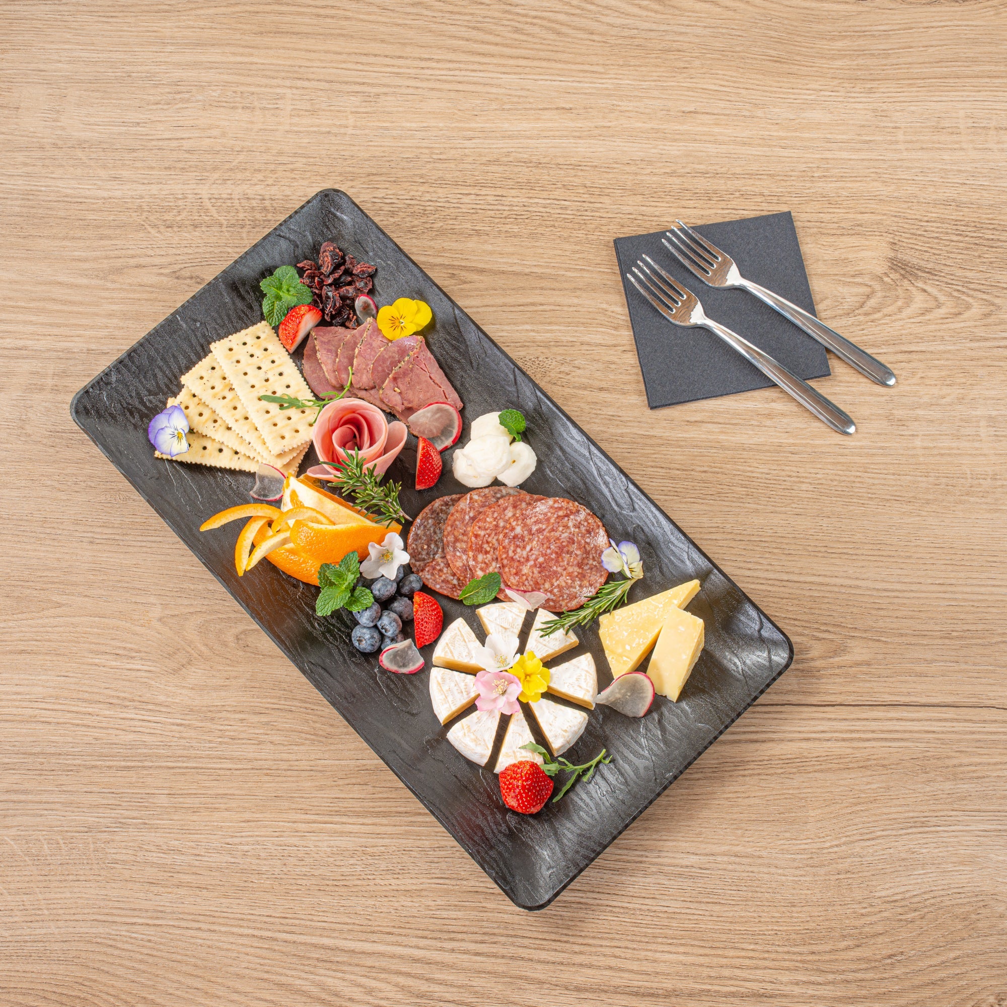Maxi Serve Rectangle Matte Black Plastic Plate - 17" x 9" - 100 count box