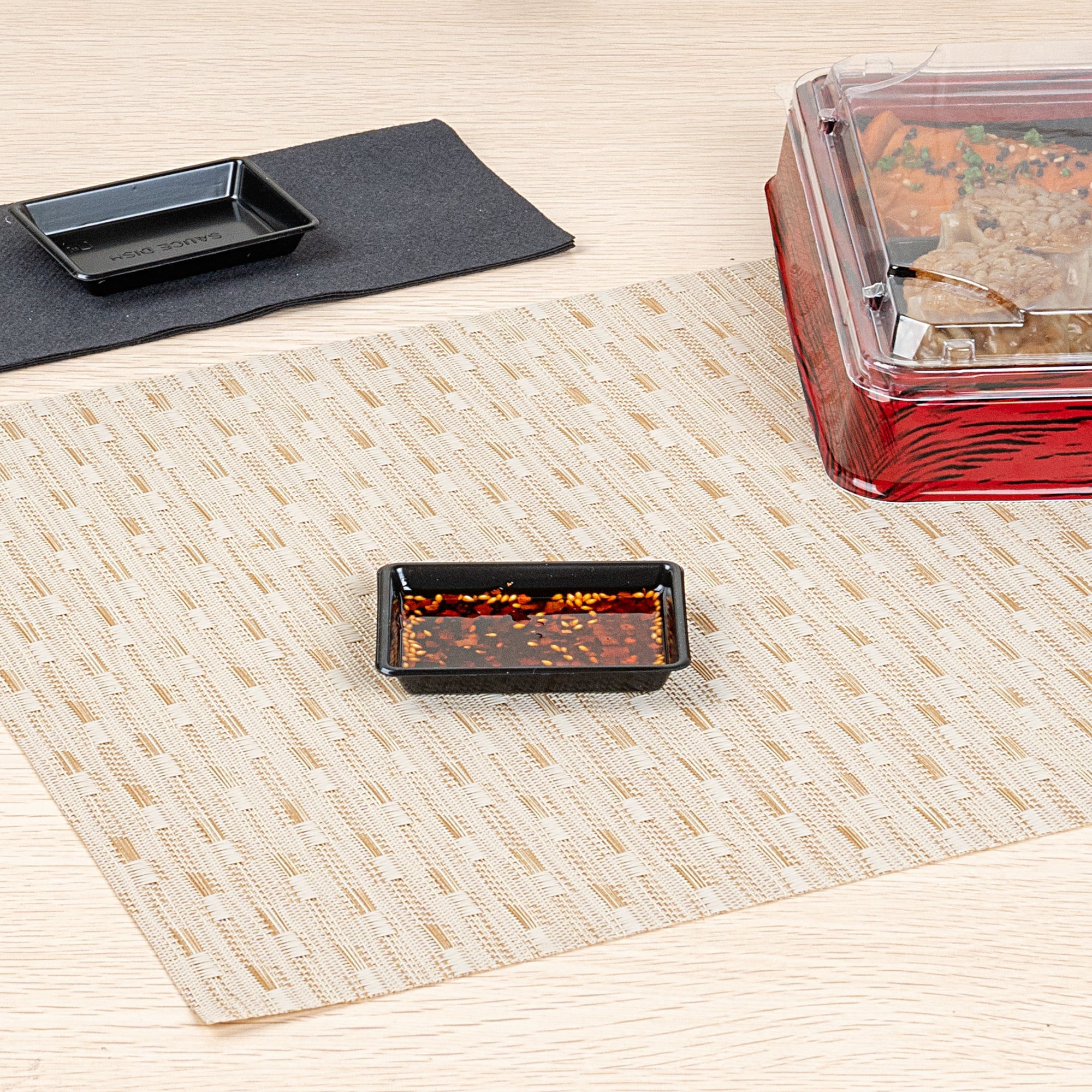 Bento Tek 1 oz Rectangle Black Plastic Sauce Dish - 3" x 2 1/4" - 1000 count box