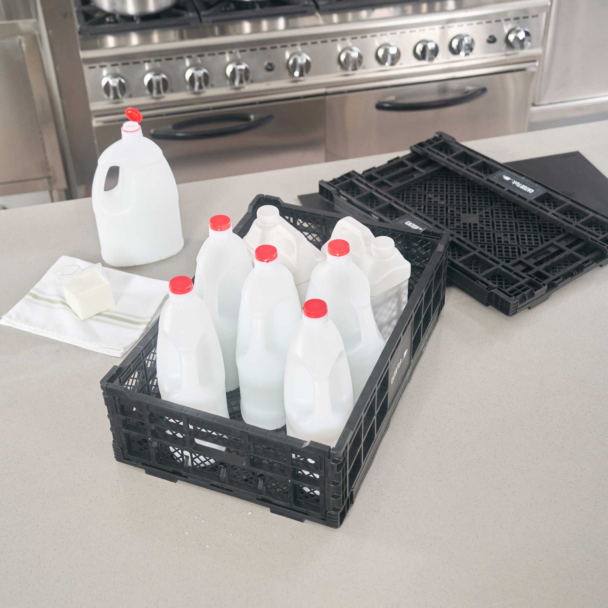 Cater Tek Rectangle Black Plastic Collapsible Crate - Vented, Stackable - 23 3/4" x 15 3/4" x 6 3/4" - 10 count box