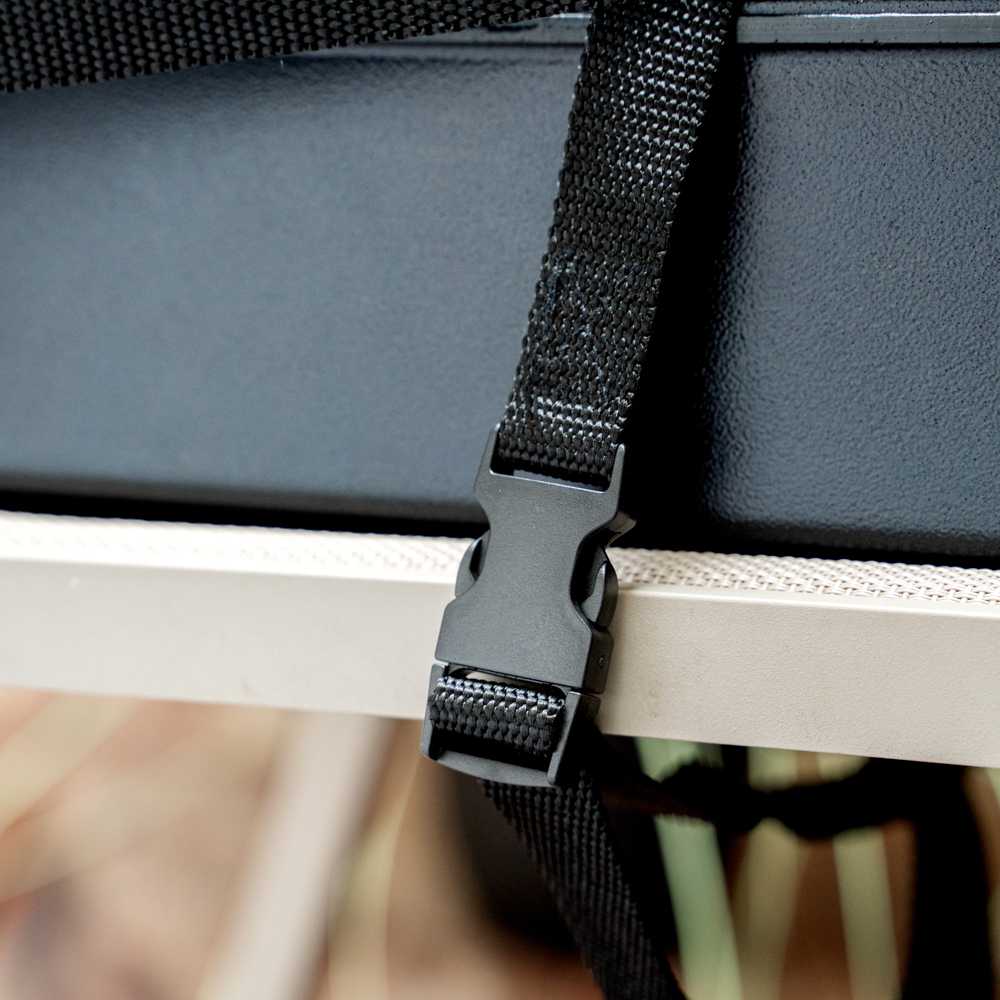 Table Tek Black Plastic Booster Seat - Dual Height, with Strap - 12 1/2" x 8 3/4" - 1 count box