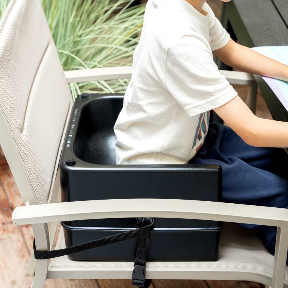Table Tek Black Plastic Booster Seat - Dual Height, with Strap - 12 1/2" x 8 3/4" - 1 count box