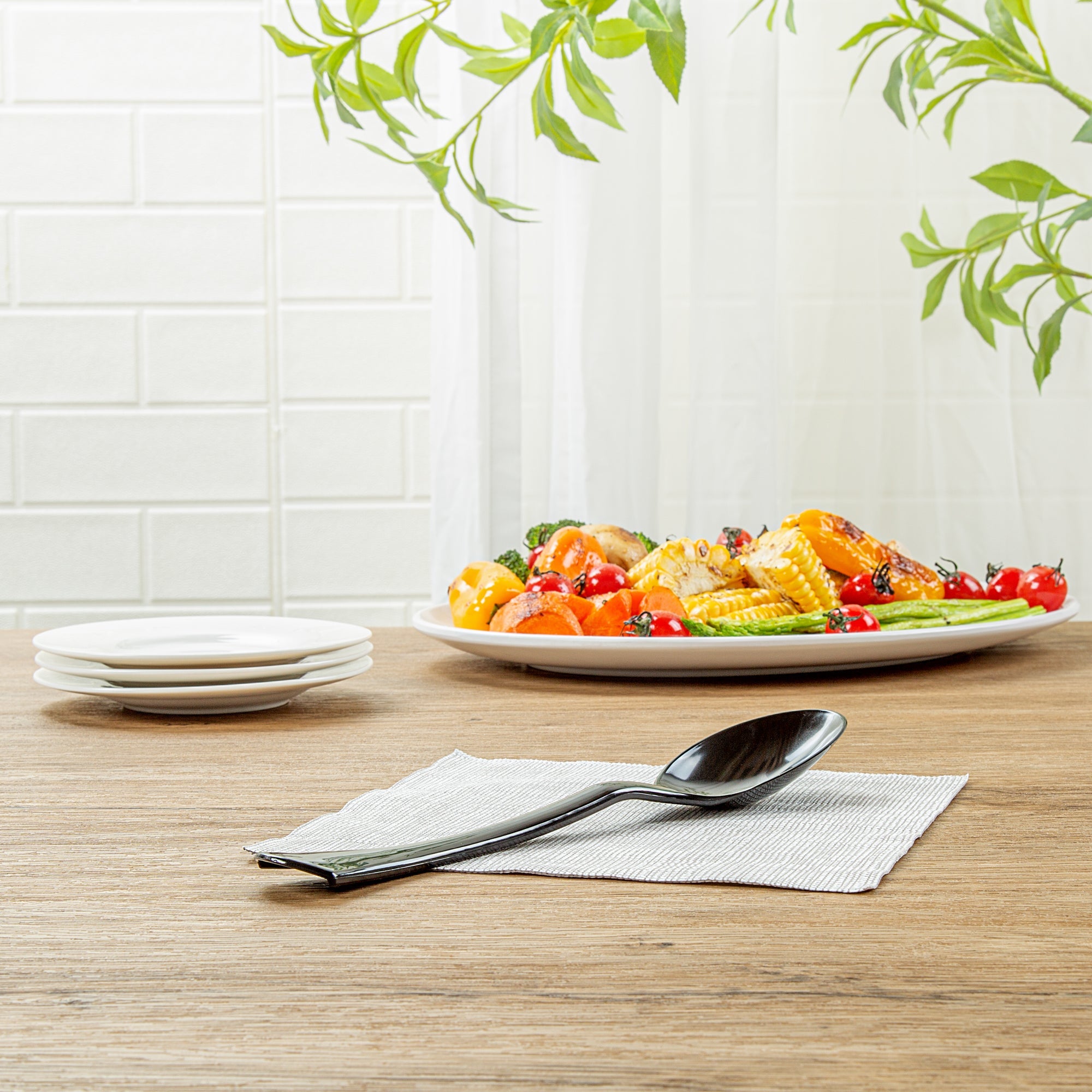 Cater Tek Black Plastic Serving Spoon - 9 3/4" - 100 count box
