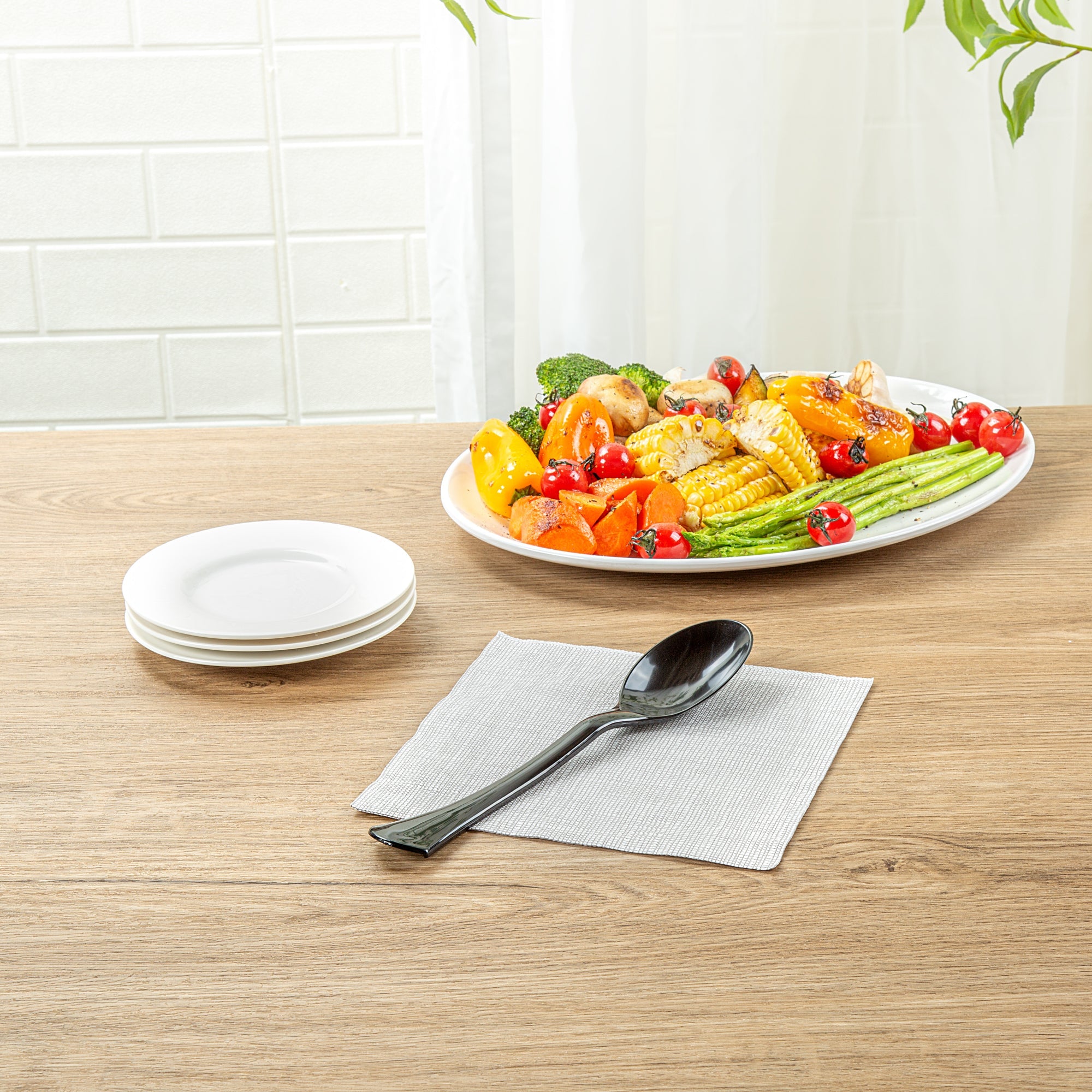 Cater Tek Black Plastic Serving Spoon - 9 3/4" - 100 count box