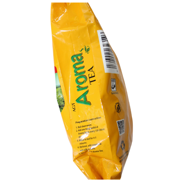 Side angled view of yellow Aroma Tea Tangawizi/Ginger bag showing barcode