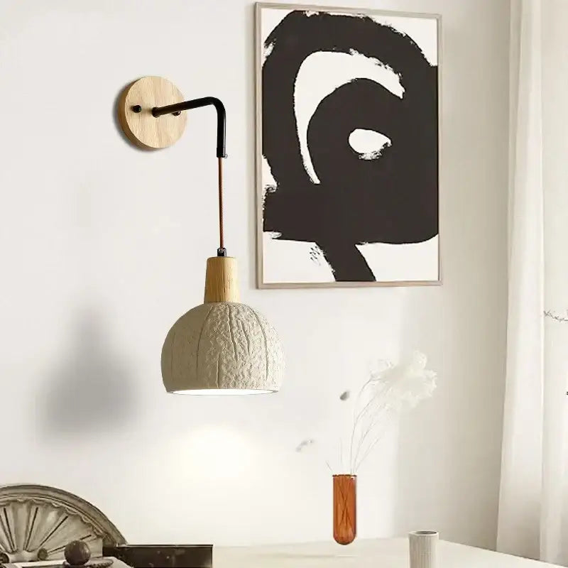 Beige ceramic wall sconce with pull chain switch for bedroom
