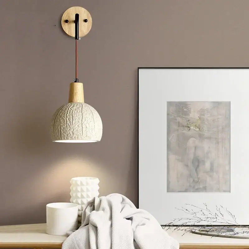 Beige ceramic wall sconce with pull chain switch for bedroom