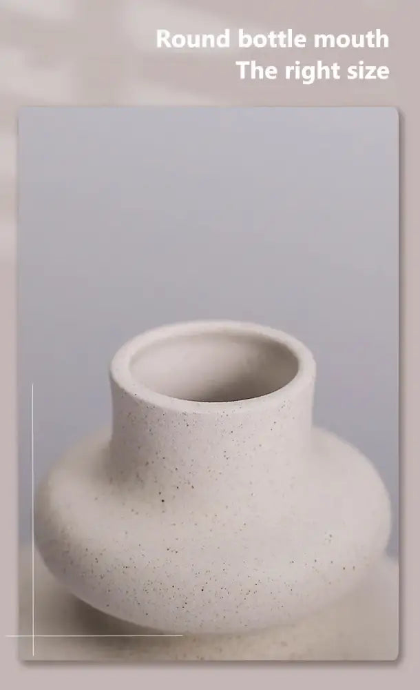 Minimalist white sculpted ceramic vases for living room home decor