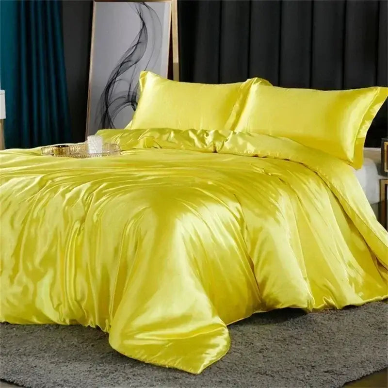 Pink glossy satin ruffled bedding set with fitted sheet bedroom