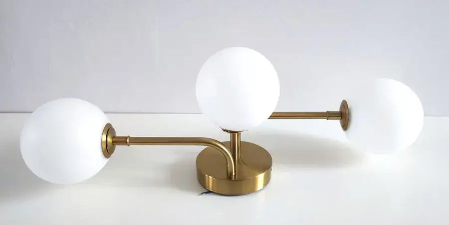 Modern brass ball ceiling light for living room with frosted glass