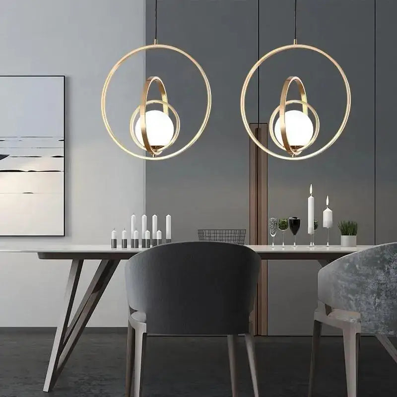 Modern rotating gold ring pendant light bedroom frosted glass globe