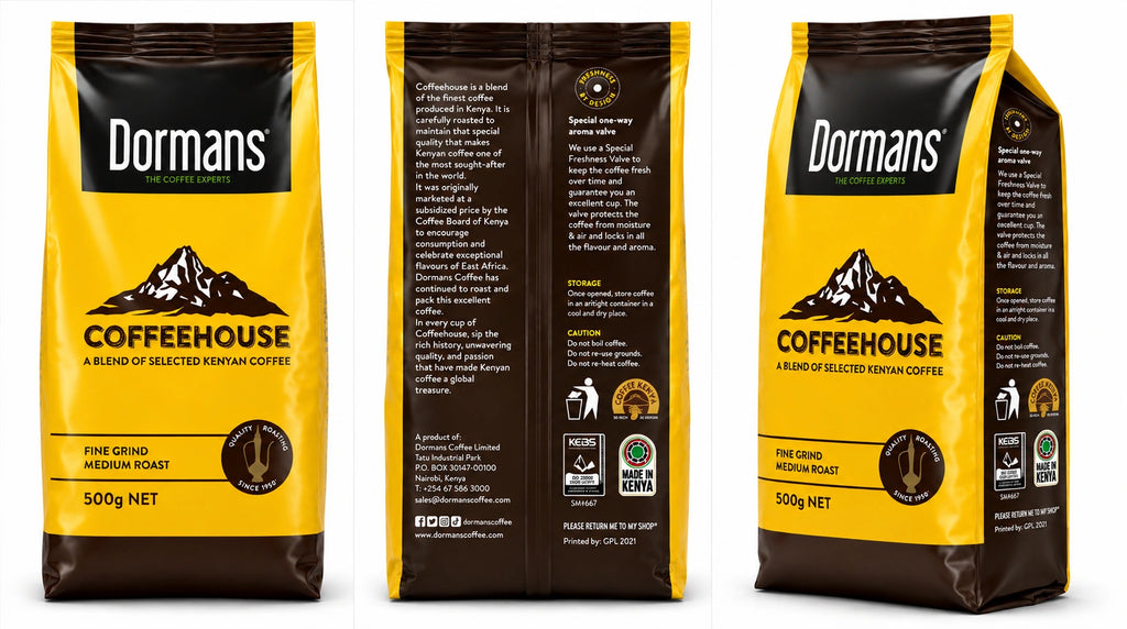 Dormans Coffeehouse Kenyan Coffee packaging range featuring three yellow and brown coffee pouches arranged from smallest to largest, with 100g, 250g and 500g net weights, medium grind and medium roast labeling, Dormans Coffee Experts branding, Coffeehouse mountain artwork and Quality Roasting Since 1950 emblems, presented against a clean white background for World Safari Shops.