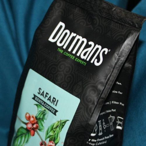 Dormans Safari Fairtrade Coffee packaging featuring Kenyan coffee branding and medium roast coffee information