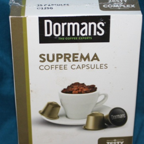 Close up of Dormans Suprema Coffee Capsules highlighting zesty and complex espresso character