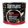 Granulated instant coffee by Dormans Supreme, 100g, showcasing the coffee granules in a clear container with a coffee cup in the background.
