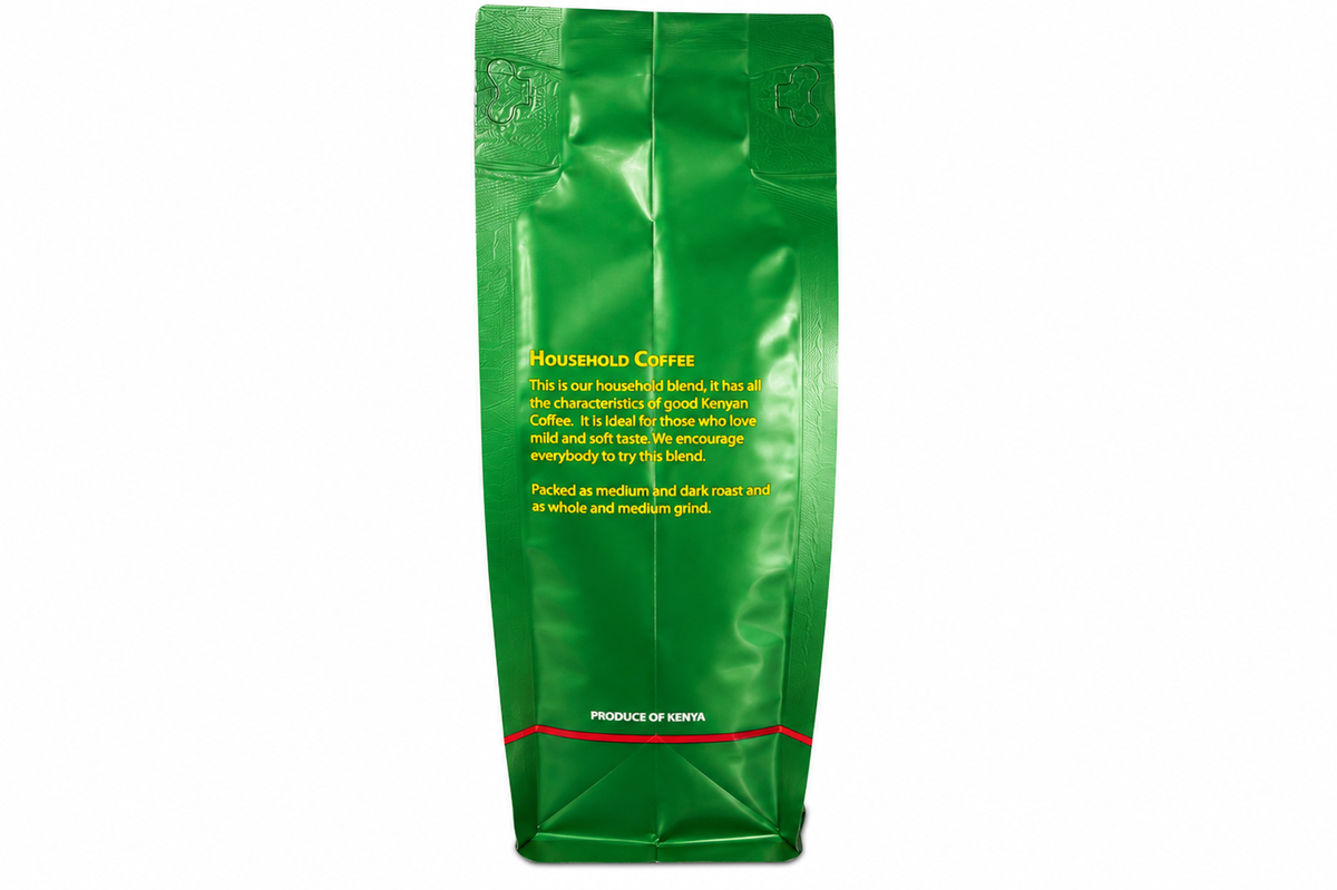 Gibsons medium roast Kenyan whole bean coffee for fresh grinding and home brewing, 400g Kenya Household blend. A green stand-up pouch of Household Coffee on a plain white background, with yellow text and a small red line near the bottom.