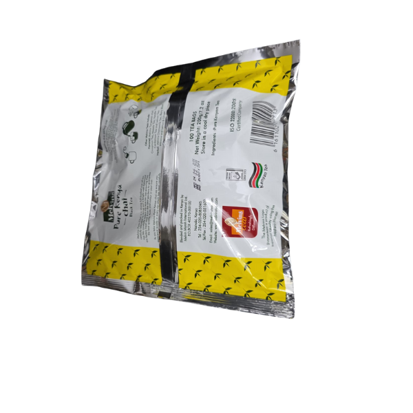 Angled back top of Melvins Pure Kenya Chai yellow pack showing barcode and back panel