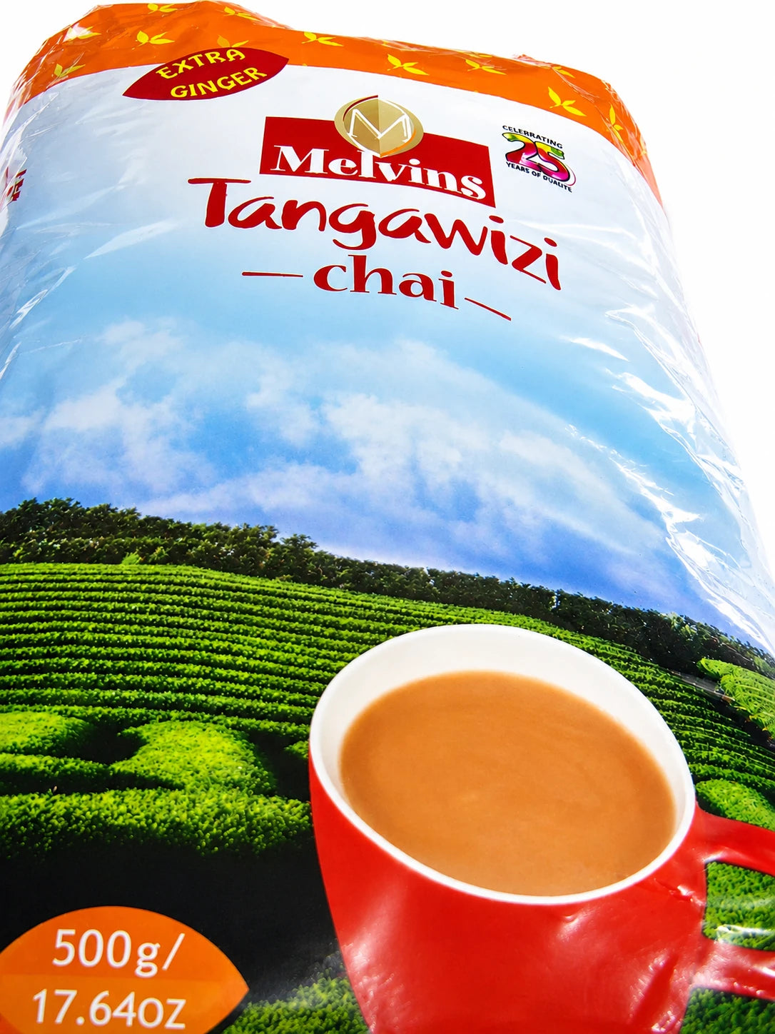 Melvins Tangawizi Chai 500g ginger black tea package featuring the Melvins brand, Tangawizi Chai product name, Extra Ginger label, Kenyan tea plantation artwork, red cup of prepared chai, and 500g family-size pack. The packaging presents a Kenyan ginger black tea product with a full-bodied tea profile, warming ginger character, and East African chai positioning, photographed against a clean white background for a clear Shopify product image.