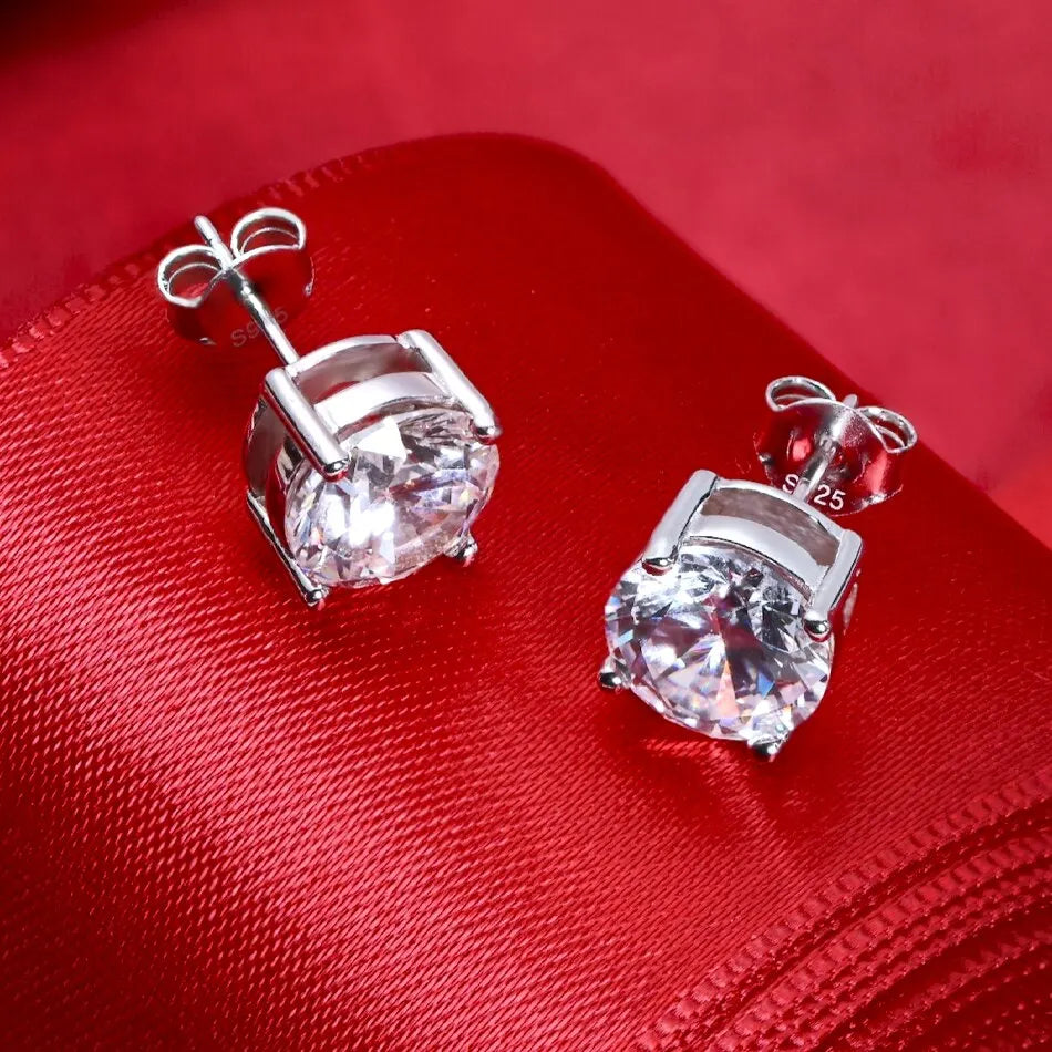Round Four-Prong Moissanite Stud Earrings in Sterling Silver
