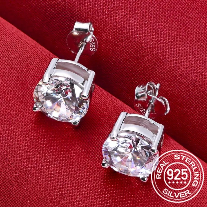 Round Four-Prong Moissanite Stud Earrings in Sterling Silver