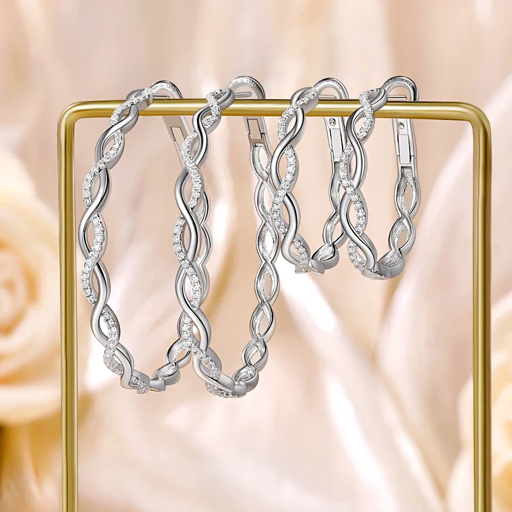 Twisted Infinity Moissanite Hoop Earrings in Sterling Silver