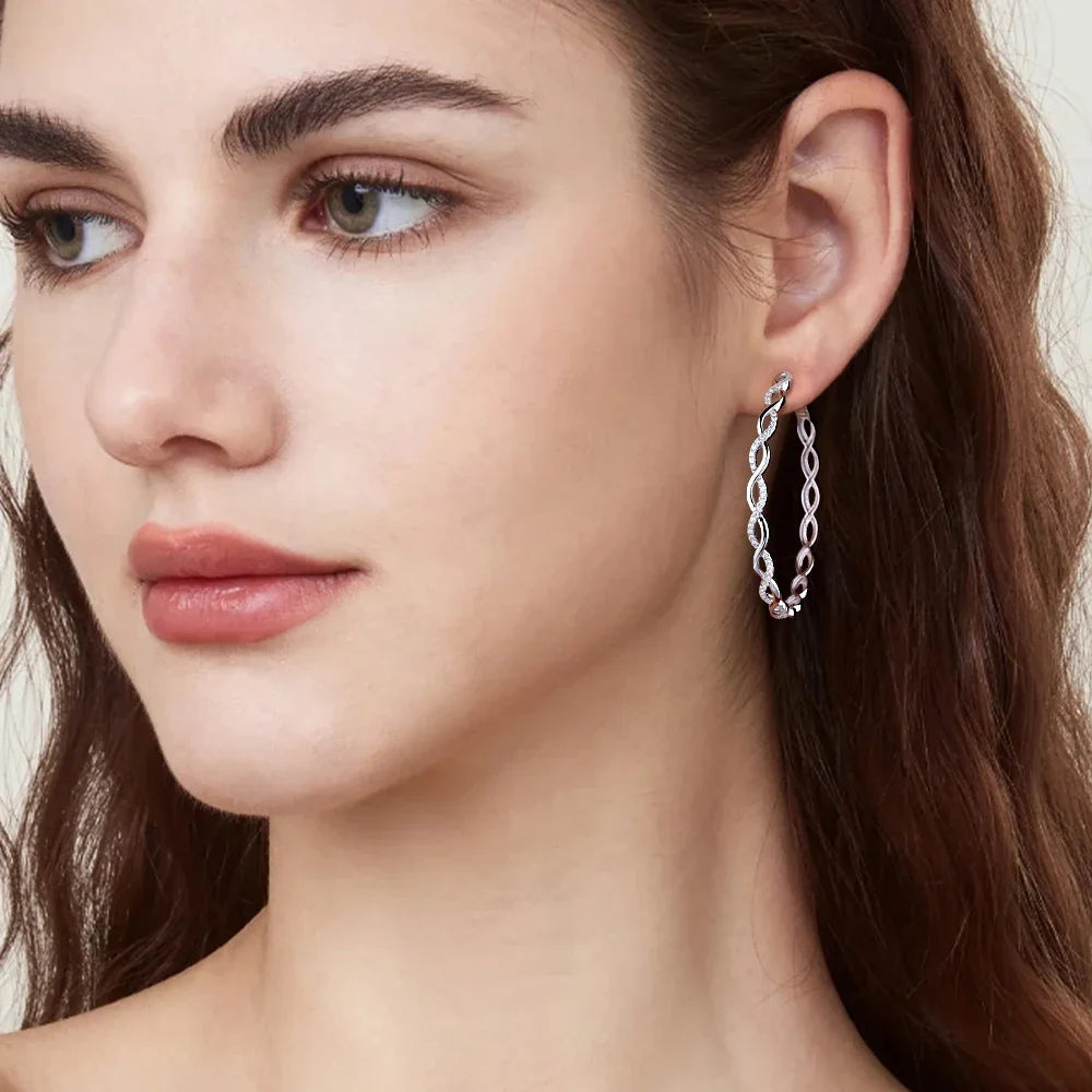 Twisted Infinity Moissanite Hoop Earrings in Sterling Silver